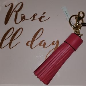 Coach tassel charm